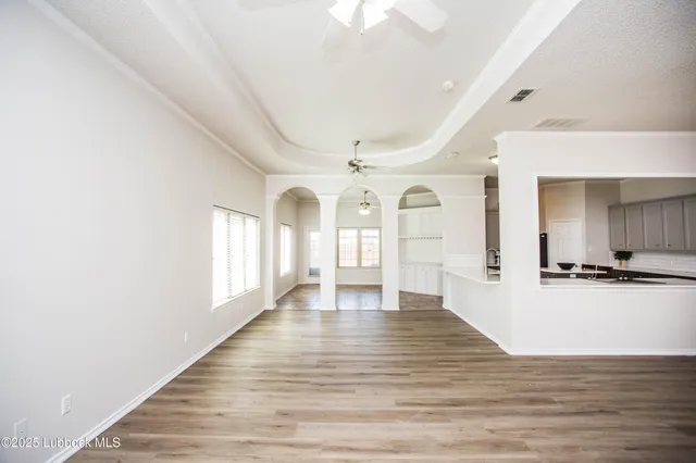 a kitchen with a stove a sink and a refrigerator