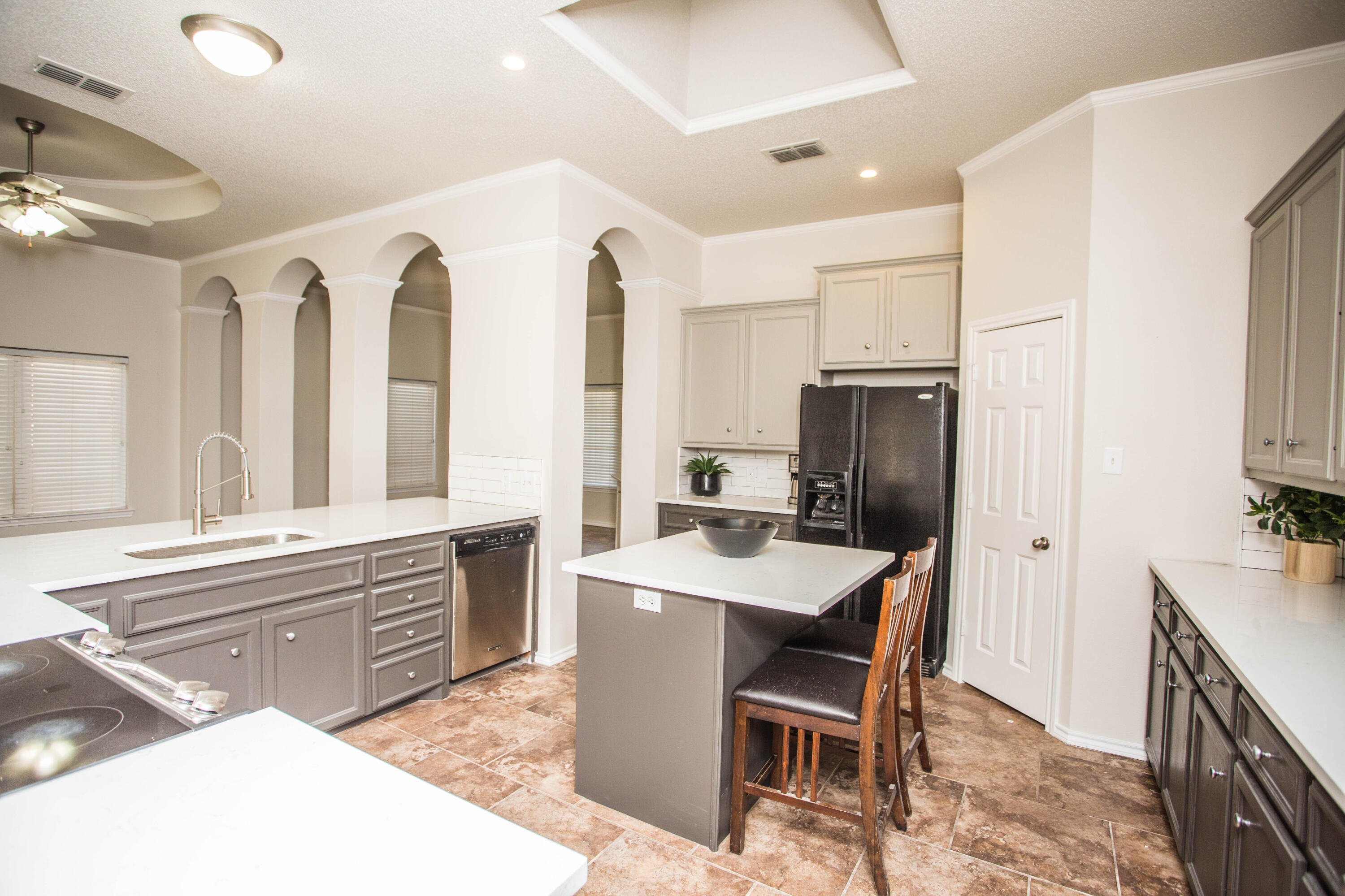 616 North 8th Street Wolfforth, TX 79382 - Photo 20 of 50 a large kitchen with a table and chairs in it