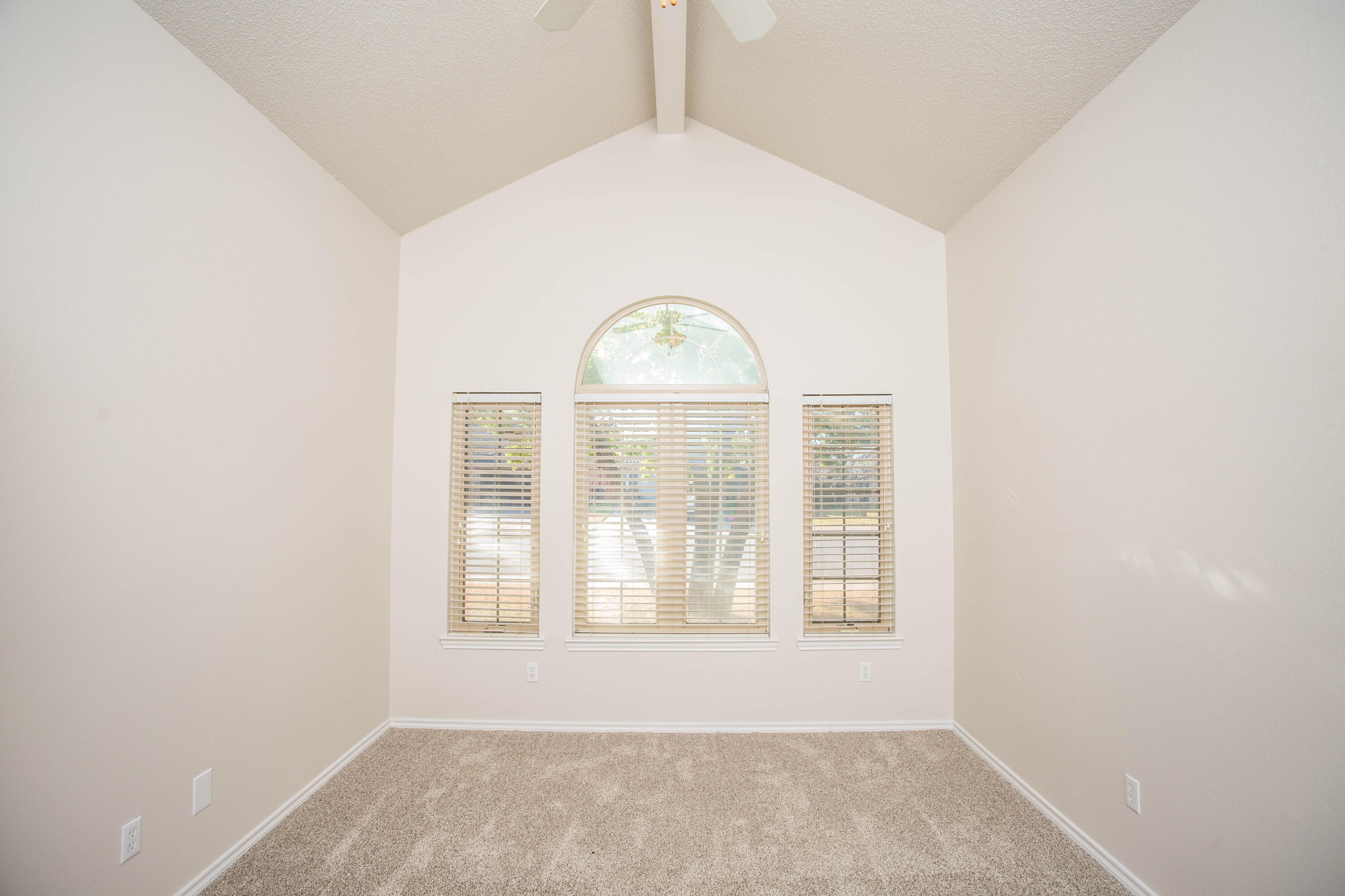 616 North 8th Street Wolfforth, TX 79382 - Photo 24 of 50 an empty room with a window