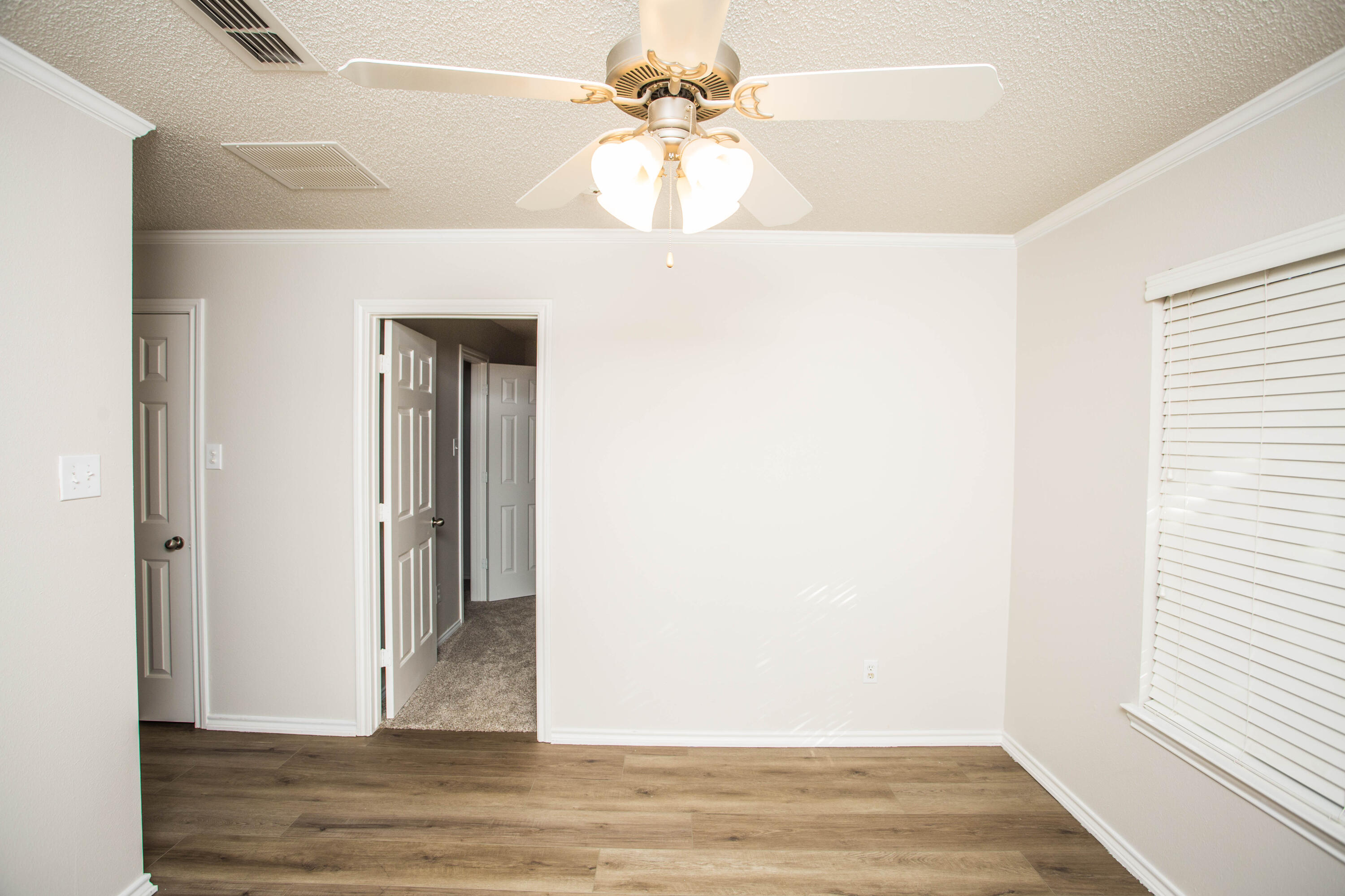 616 North 8th Street Wolfforth, TX 79382 - Photo 33 of 50 a view of a room with wooden floor