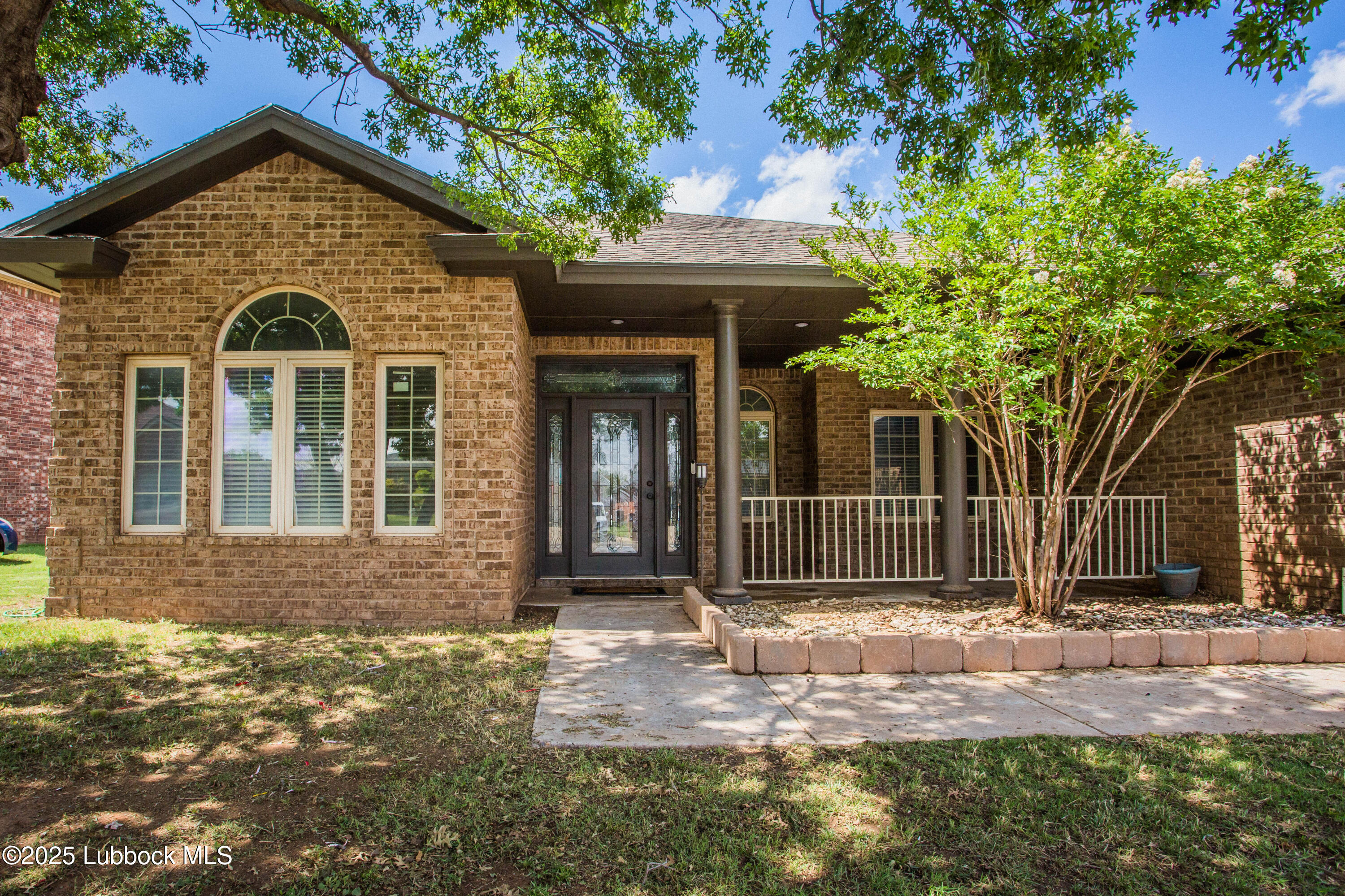616 North 8th Street Wolfforth, TX 79382 - Photo 7 of 50 a front view of a house with a yard