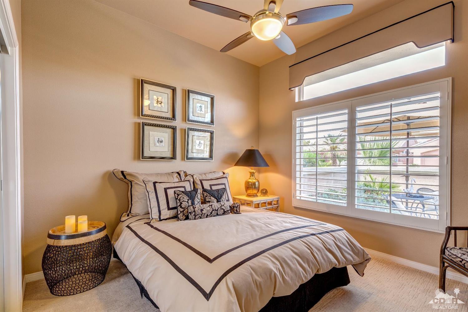 78087 Hunter Point Road Palm Desert, CA 92211 - Photo 23 of 37 a bedroom with a bed and window