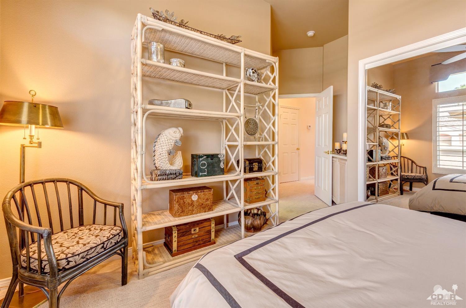 78087 Hunter Point Road Palm Desert, CA 92211 - Photo 24 of 37 a bedroom with furniture and a window