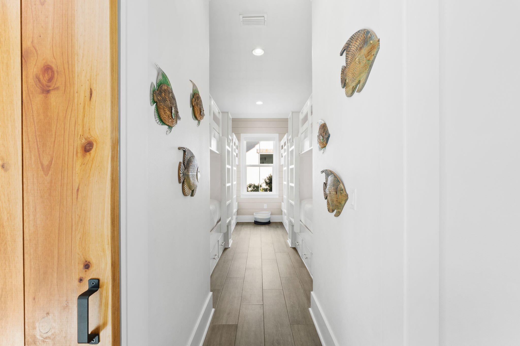 17 Penny Lane Santa Rosa Beach, FL 32459 - Photo 71 of 91 a view of a hallway with wooden floor