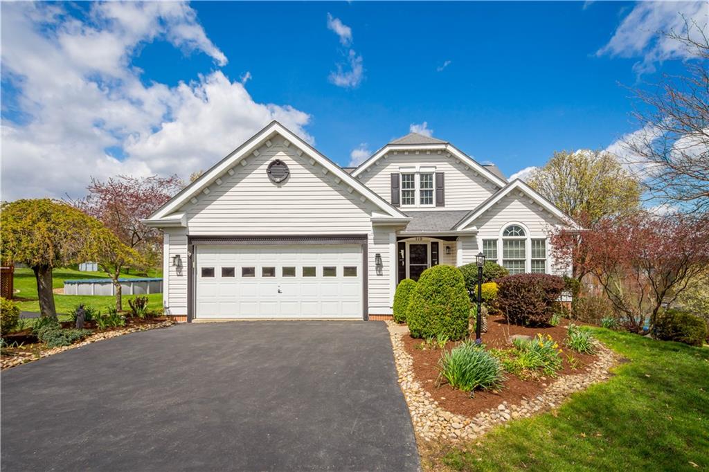 110 Walnut Drive Eighty Four, PA 15330 - Photo 2 of 50 a front view of a house with a yard and garage