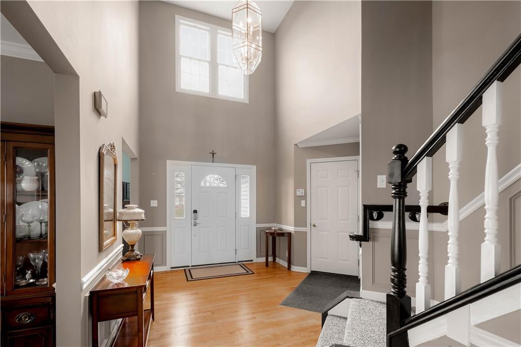 110 Walnut Drive Eighty Four, PA 15330 - Photo 4 of 50 a view of an entryway with wooden floor and windows