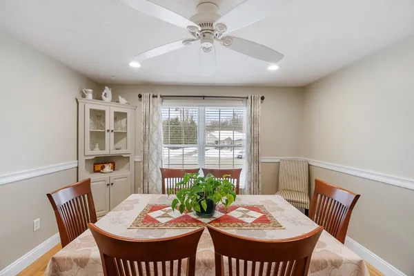 a view of a dining room with furniture window and outdoor view