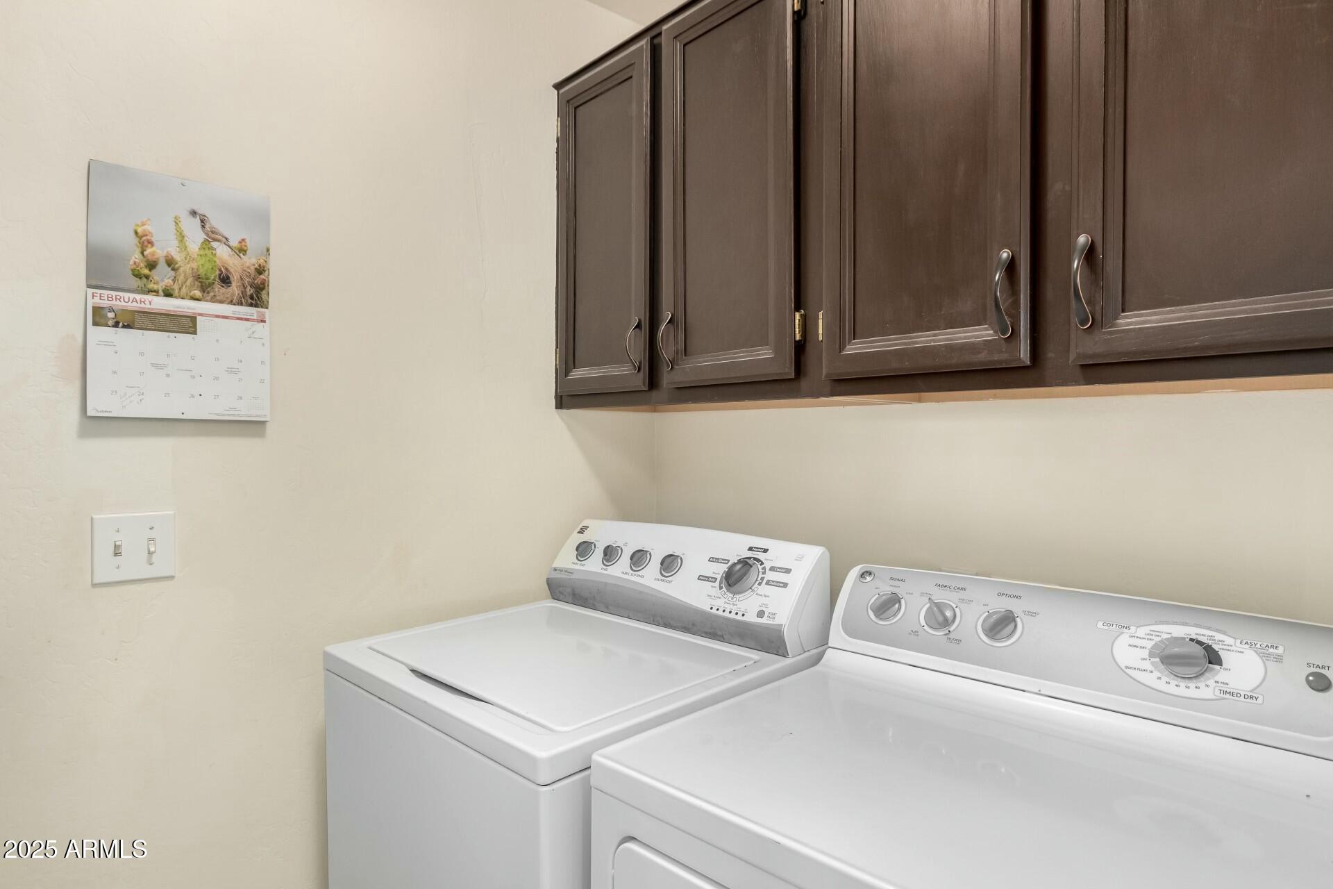 5445 East McKellips Road, Unit 54 Mesa, AZ 85215 - Photo 17 of 26 a utility room with dryer and washer