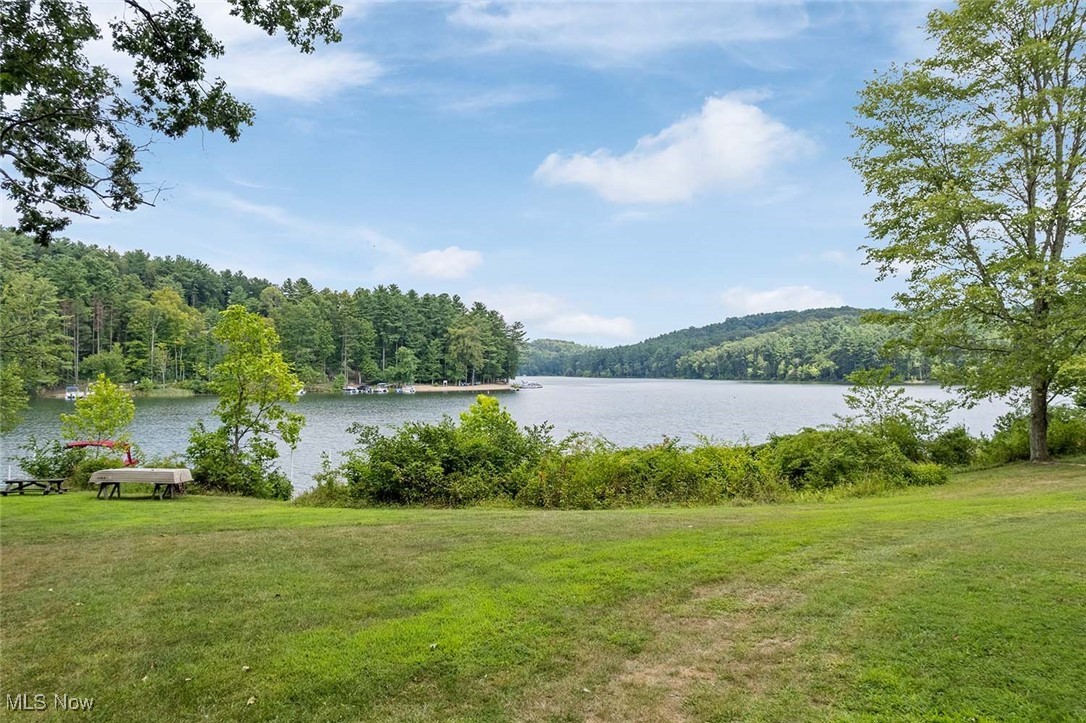 6103 Azalea Road Southwest, Unit LOT 6 Bowerston, OH 44695 - Photo 13 of 24 Water view with a forest