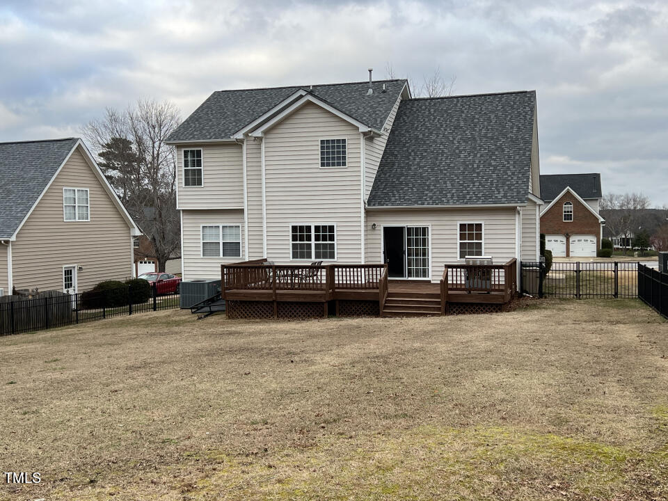 613 Seastone Street Raleigh, NC 27603 - Photo 10 of 13 a view of a house with a patio