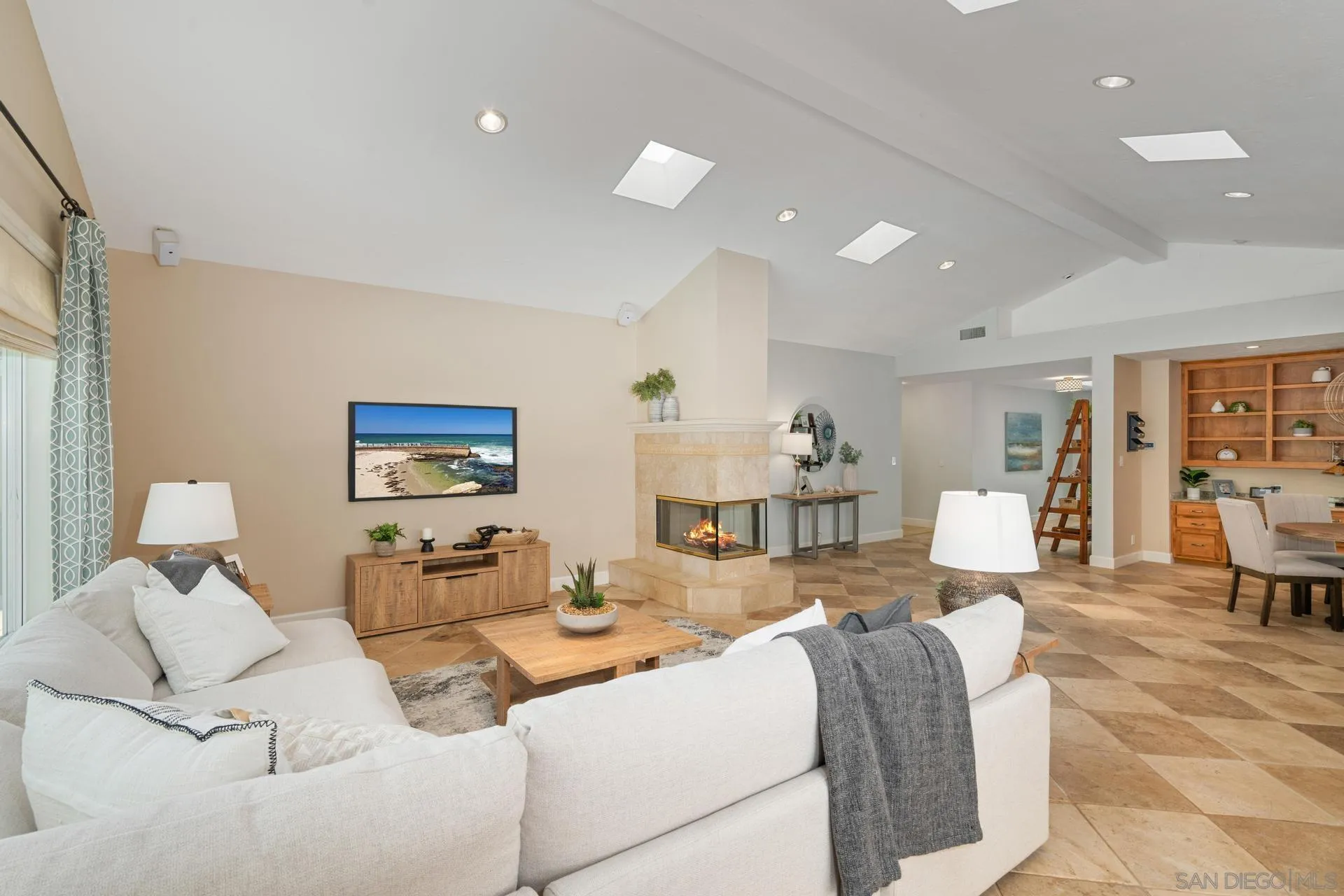 13678 Orchard Gate Road Poway, CA 92064 - Photo 13 of 29 a living room with furniture and a flat screen tv