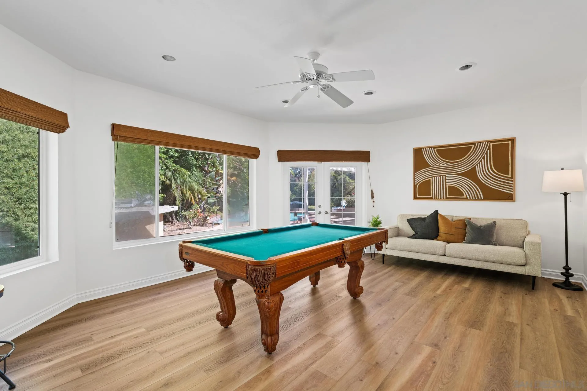 13678 Orchard Gate Road Poway, CA 92064 - Photo 22 of 29 a living room with furniture and a wooden floor