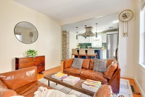 a view of living room washer and dryer