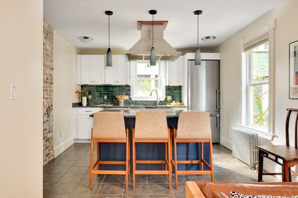 33 Line Street, Unit 1 Cambridge, MA 02138 - Photo 9 of 22 a dining room with furniture and window