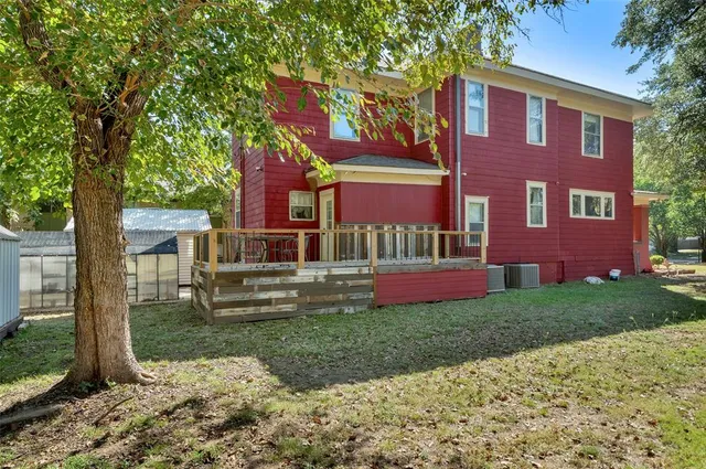 a view of a livingroom with furniture and front door