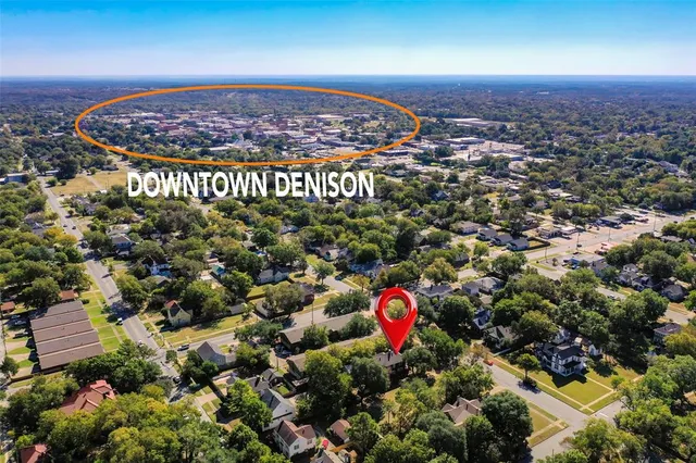 an aerial view of a multi story residential apartment building