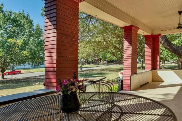 a view of balcony with a potted plant