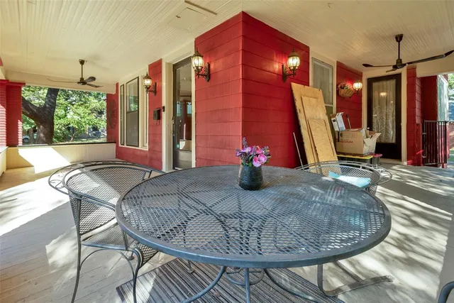 a dining room with a table and chairs