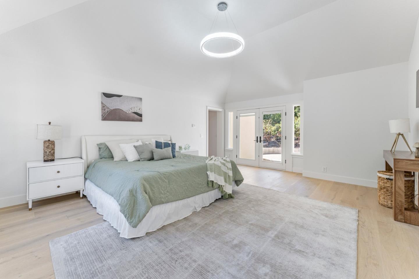 1080 Finley Road Pleasanton, CA 94588 - Photo 16 of 85 a spacious bedroom with a bed and a large window