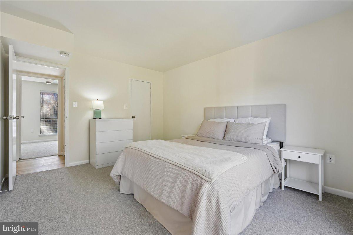 17810 Buehler Road, Unit 2C4 Olney, MD 20832 - Photo 13 of 31 Serene bedroom with soft neutral tones.