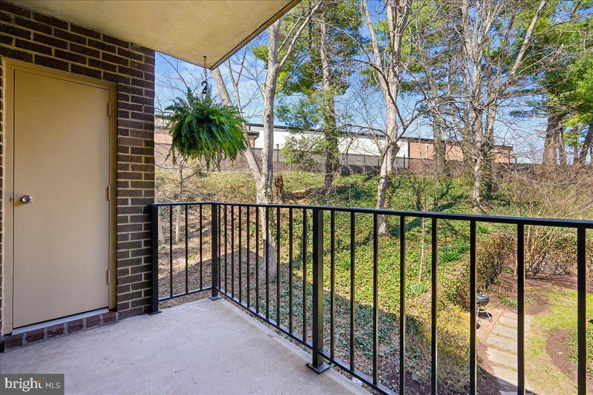 17810 Buehler Road, Unit 2C4 Olney, MD 20832 - Photo 23 of 31 Serene balcony with lush greenery.