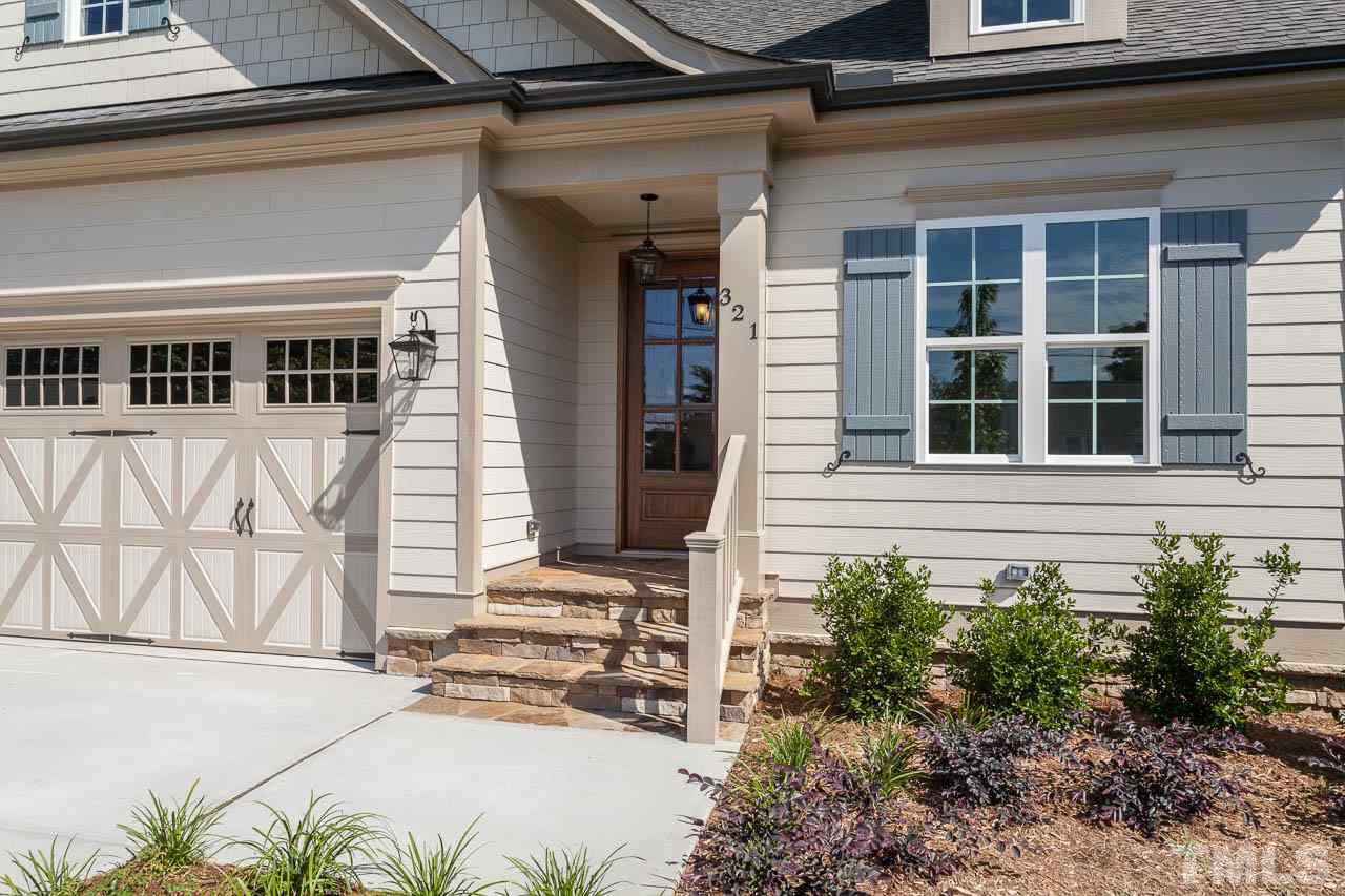 321 Georgetown Road Raleigh, NC 27608 - Photo 3 of 25 a view of a house with a outdoor space