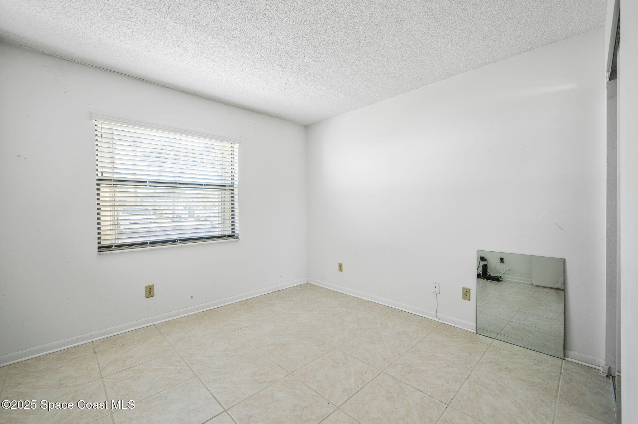 588 North Wickham Road, Unit 45 Melbourne, FL 32935 - Photo 16 of 32 Second Bedroom
