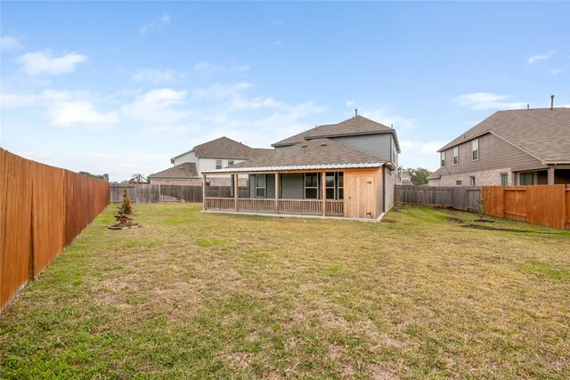 a house view with a garden space