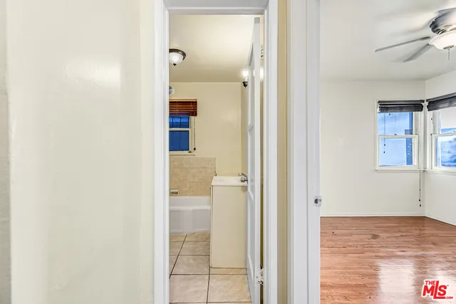 a bathroom with a bathtub and toilet