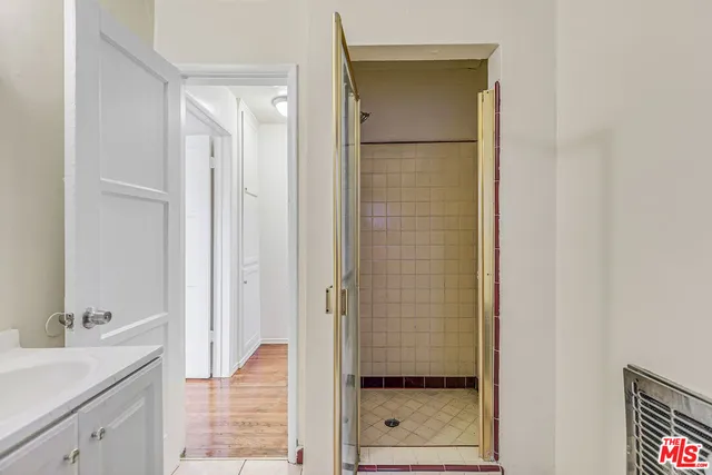 a view of an empty room with a window