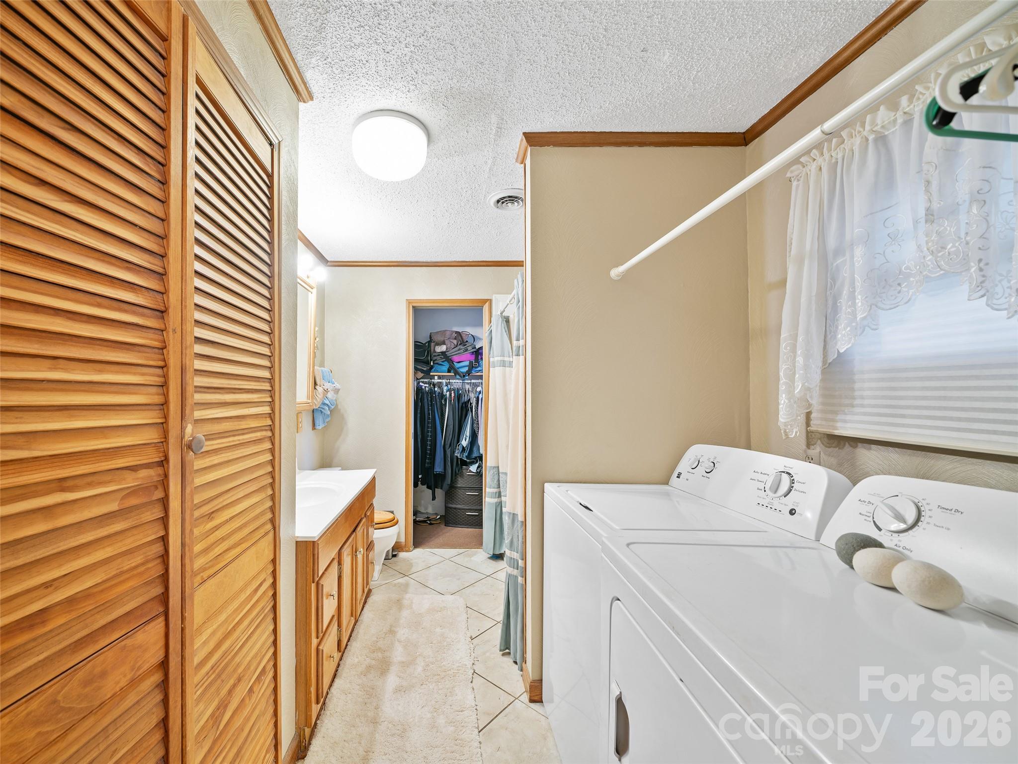 1280 Hamburg Road Bakersville, NC 28705 - Photo 17 of 28 a utility room with dryer and washer