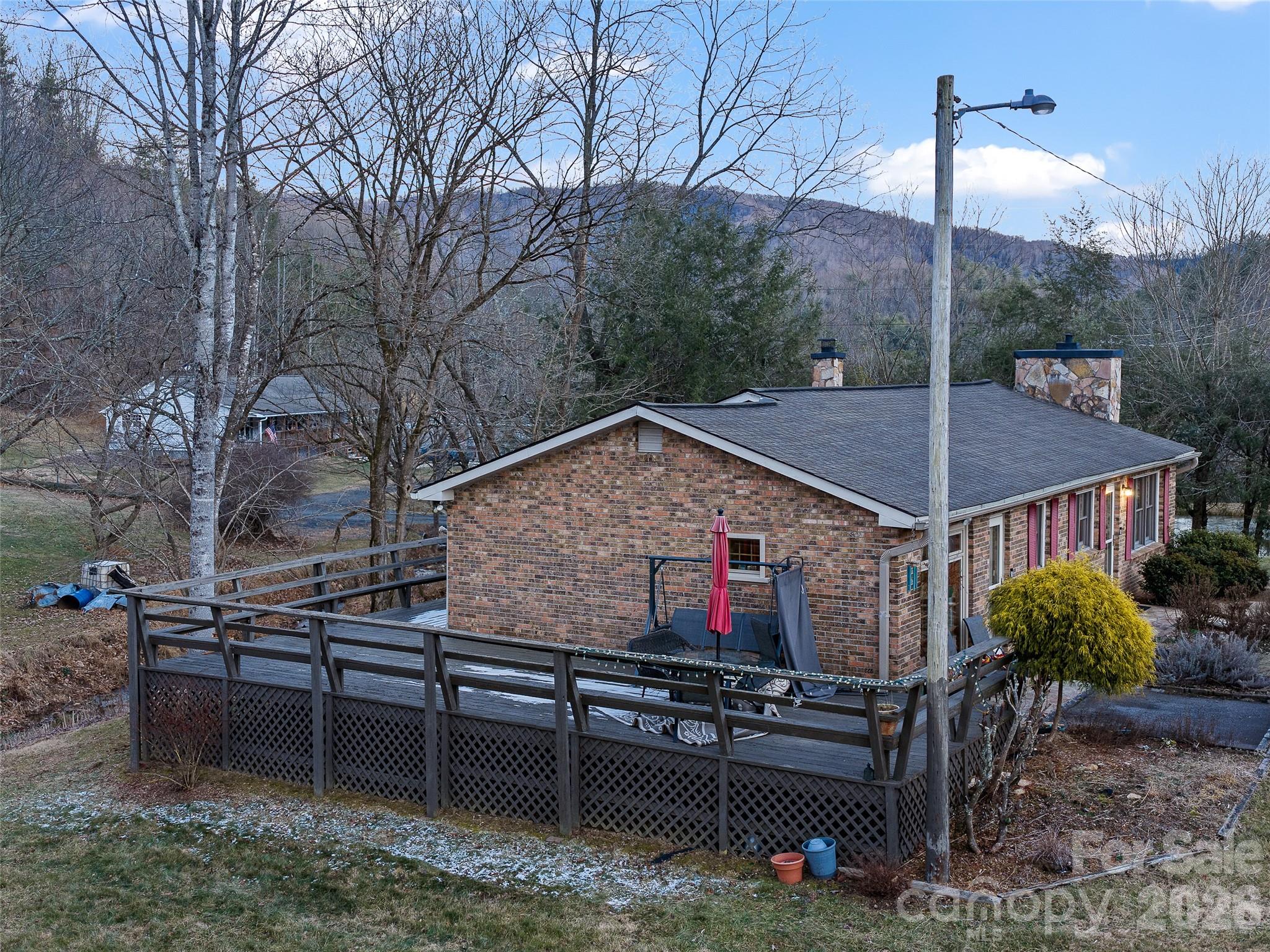 1280 Hamburg Road Bakersville, NC 28705 - Photo 27 of 28 a view of a couches in the patio