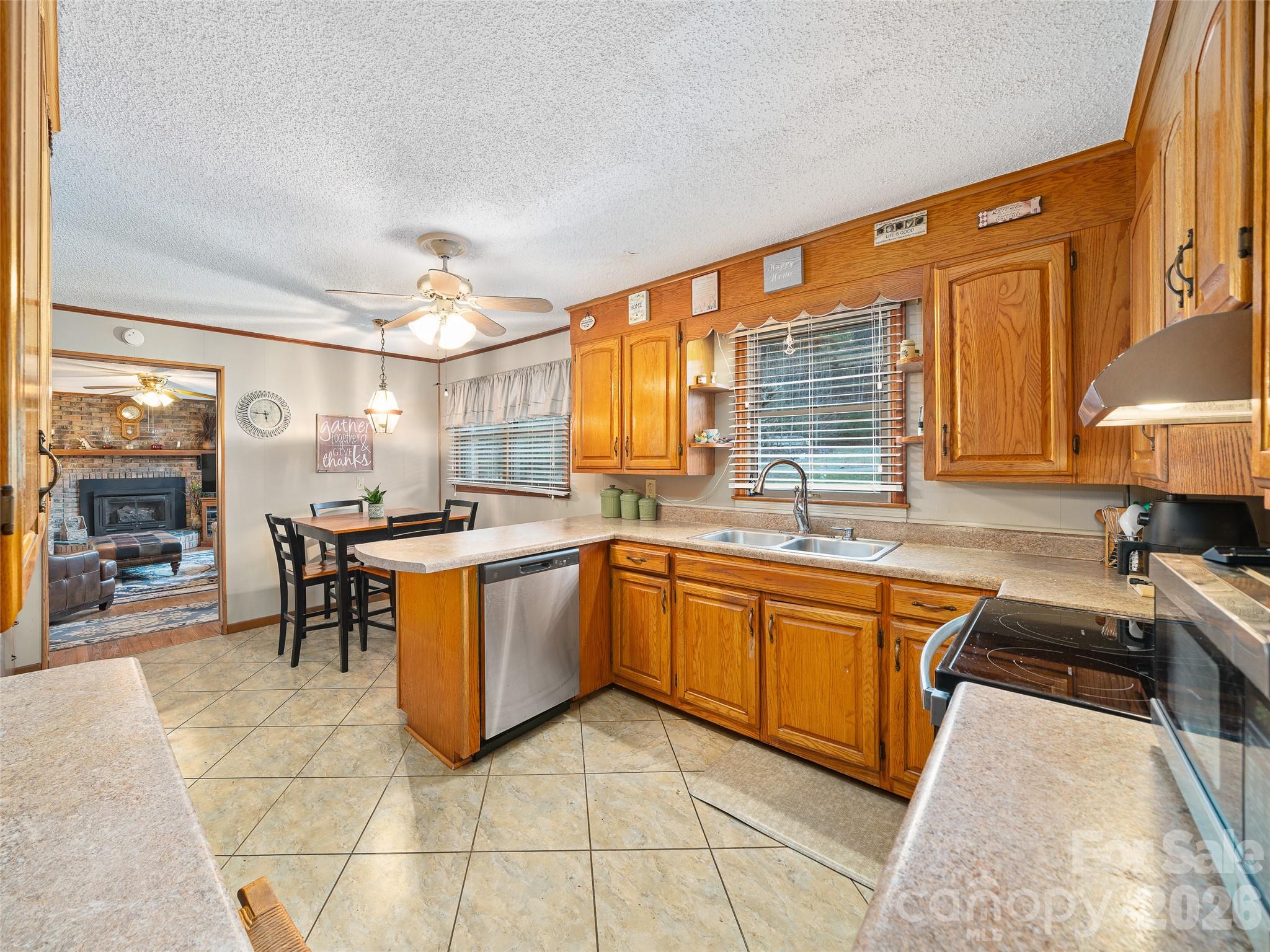 1280 Hamburg Road Bakersville, NC 28705 - Photo 6 of 28 a large kitchen with granite countertop a sink and a counter top space