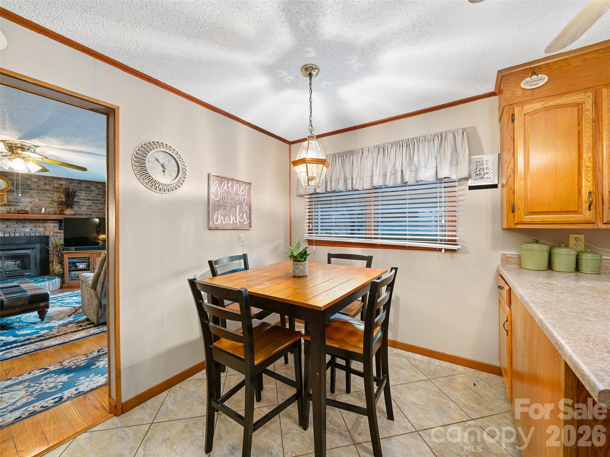 1280 Hamburg Road Bakersville, NC 28705 - Photo 9 of 28 a kitchen with a table and chairs in it