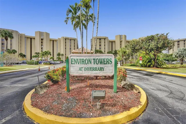 a front view of a house with yard