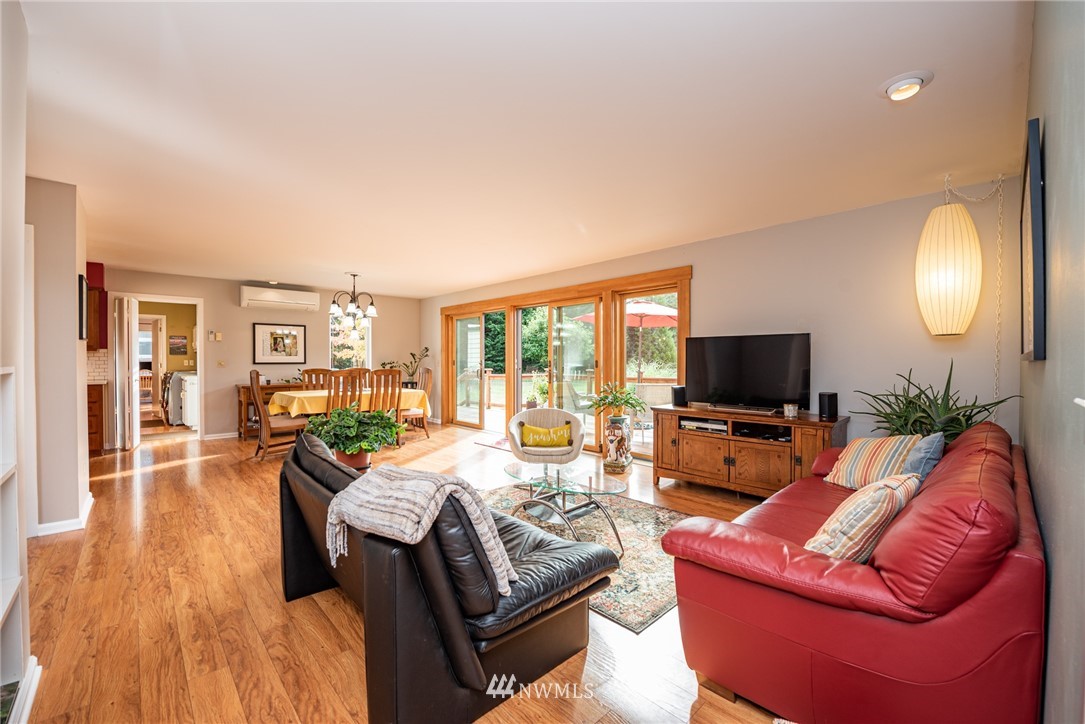 481 Holgerson Road Sequim, WA 98382 - Photo 11 of 40 a living room with furniture and a flat screen tv