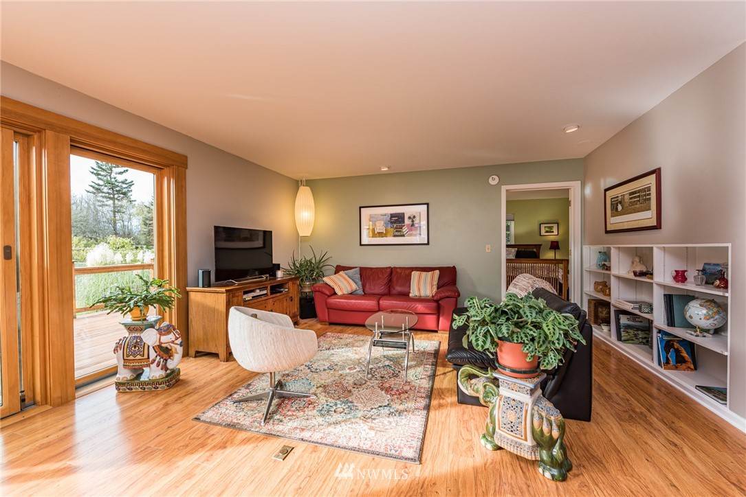481 Holgerson Road Sequim, WA 98382 - Photo 12 of 40 a living room with furniture and a flat screen tv