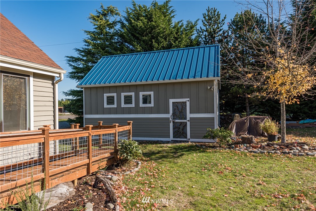 481 Holgerson Road Sequim, WA 98382 - Photo 31 of 40 a view of house with backyard and furniture