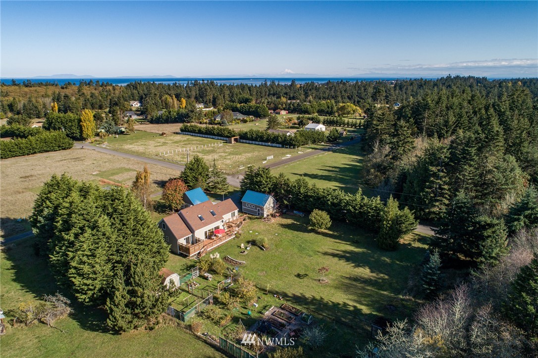 481 Holgerson Road Sequim, WA 98382 - Photo 6 of 40 an aerial view of a house with a yard