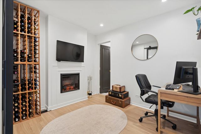 a bedroom with a workspace