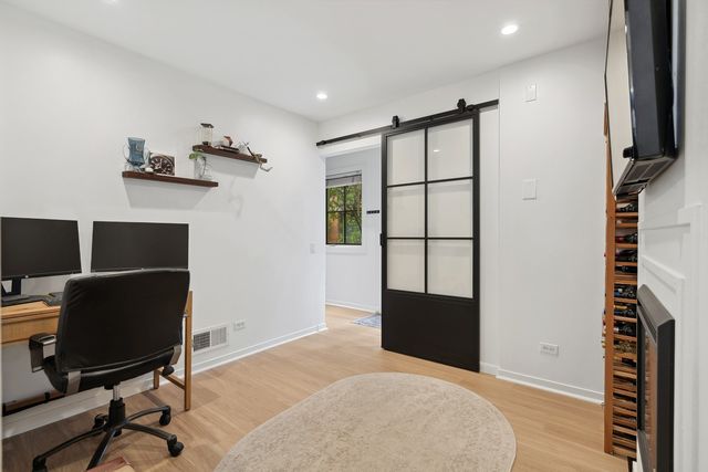 a workspace with furniture and window