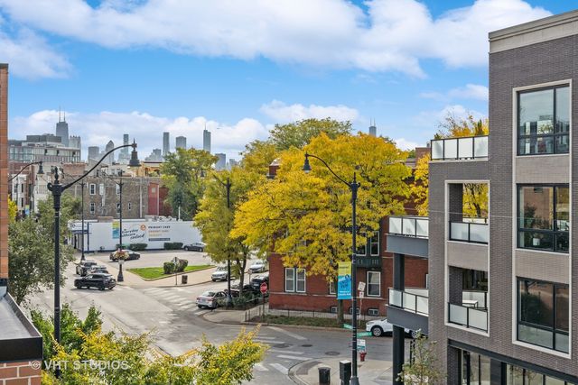 a view of a city with tall buildings