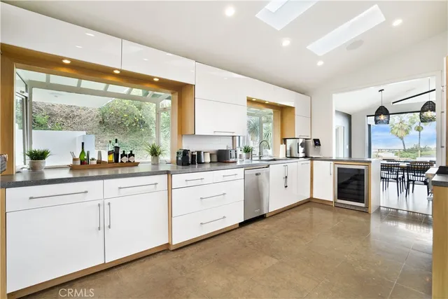 a bedroom with a bed and a chair