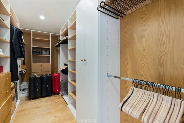 a view of a house with swimming pool and sitting area