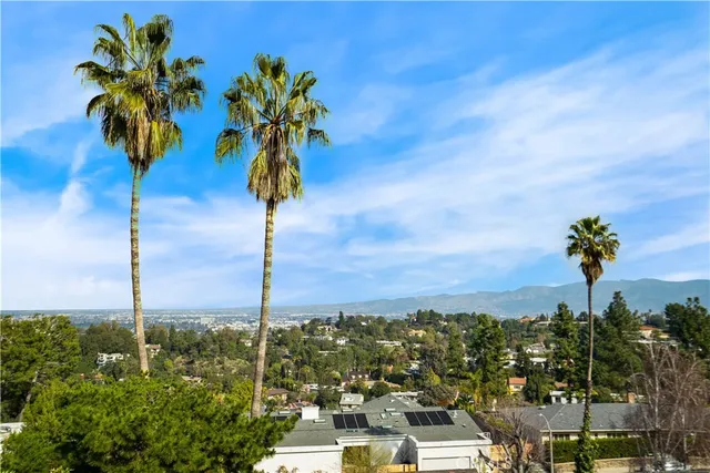 an aerial view of a house with a garden