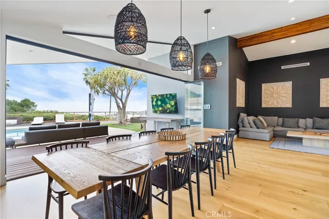 a view of a dining room with furniture window and outside view