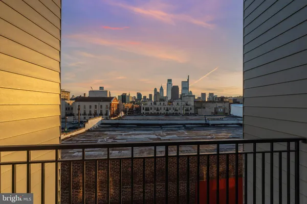 a view of a balcony with city view