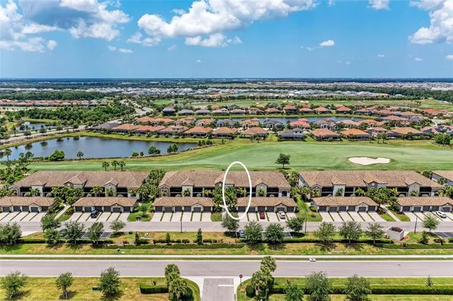 $395,000 | 5517 Palmer Circle, Unit 104, Bradenton, FL 34211