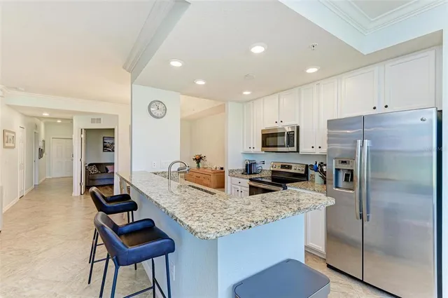 $395,000 | 5517 Palmer Circle, Unit 104, Bradenton, FL 34211