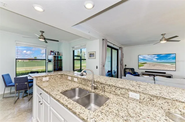 $395,000 | 5517 Palmer Circle, Unit 104, Bradenton, FL 34211